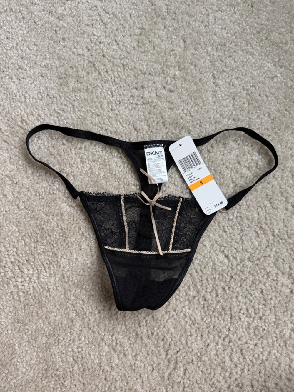 DKNY Black Thong with Cream Trim and Bow Accent